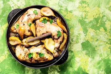 Chicken baked in pear sauce.