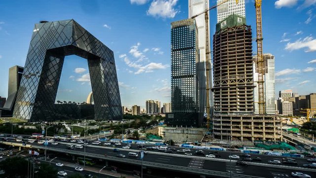 Beijing,China-Sep 3,2018: Timelapse of the floating clouds over the landmark building at Guomao CBD, Beijing, China