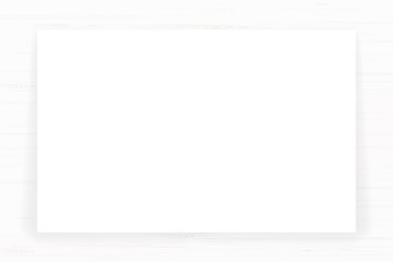 White paper sheet on wood texture background. Vector.