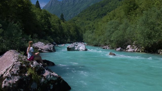 Aerial - Beautiful blue river running through the mountain valley