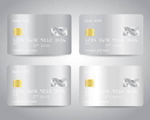 Realistic detailed silver credit cards set with abstract white chrome metallic gradient design