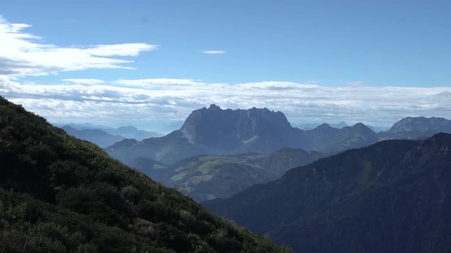 gimbal 60 fps slomo crane over zen stones in the tyrolean alps view to wilder kaiser