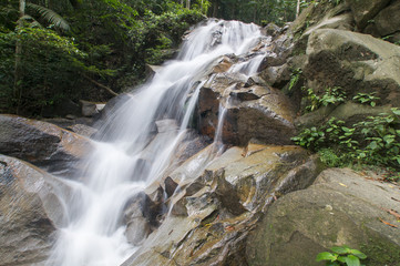 small waterfalls in tropical forest.