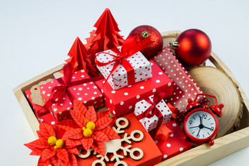 Christmas gift box and decorations in wooden box.