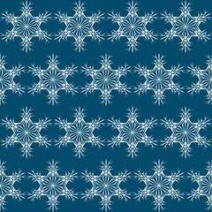 Vector pattern of winter theme  snowflakes to decorate the New Year and Christmas holidays on a dark blue background