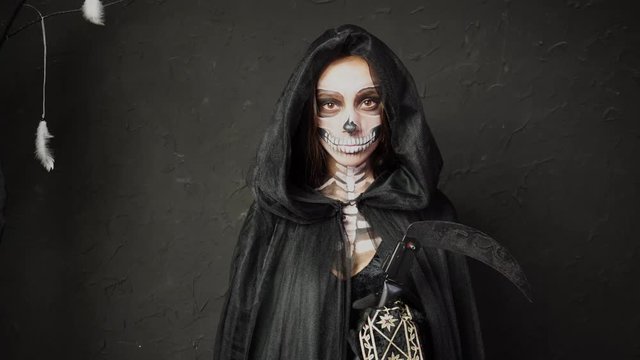 Creepy Scary Spooky Woman In Halloween Death Reaper Cape Costume Heavy Professional Skeleton Makeup Approaching Camera