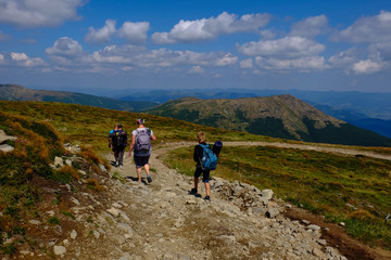 Fototapeta premium hikers on the mountain path