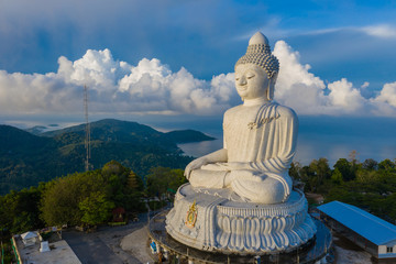 aerial photography scenery blue sky and blue ocean behind Phuket white big Buddha. Phuket white big Buddha is the .famous landmark in Phuket island  a lot of tourists visiting this landmark every day