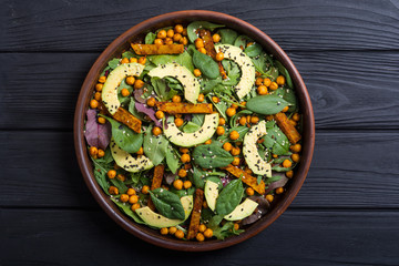 Baby spinach salad with sweet potato , chickpeas and avocado