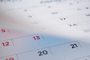 calendar page flipping sheet close up background