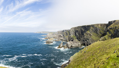 Fototapeta na wymiar Panoramic picture of cliff line from Mizen Head lighthouse in Ireland