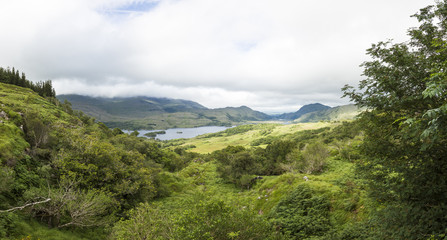 Fototapeta na wymiar Panoramic picture from Ladies View outlook at Killarney National Park min southern Ireland