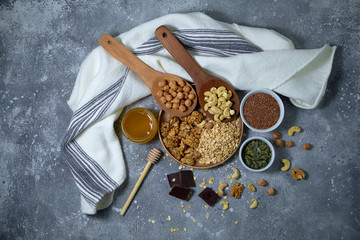 Various nuts on stone table. Top view with copy space