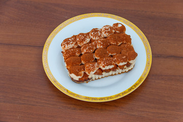 Traditional italian dessert tiramisu on a table