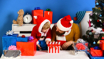 Man with beard and son with happy faces