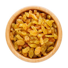 Golden raisins in wooden bowl isolated on white. Dried fruits. Top view