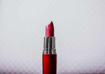 red lipstick on a white background