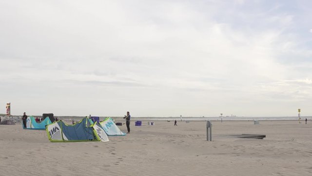 Kitesurfer checking their Equipment on Ijmuiden Beach next to Amsterdam
