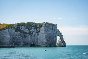 Fototapeta na wymiar Spectacular natural cliffs Aval of Etretat and beautiful famous coastline, Normandy, France, Europe.