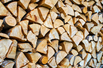 firewood of different shapes folded, close-up background