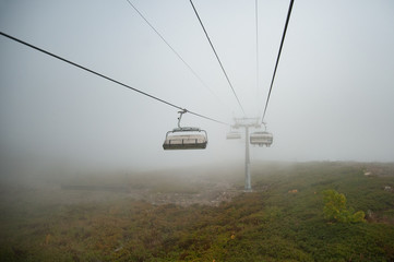 Ski lifts in the clouds