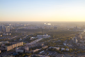 Fototapeta na wymiar Panorama of Moscow from a height. View of the Poklonnaya Hill. Sunset.