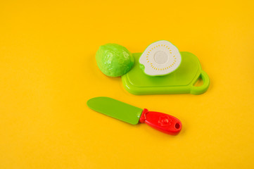Children's toy plastic fruit in a basket