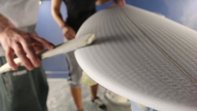 Pro surfer makes a surfboard