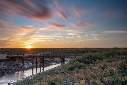 Autumn Sunset Over The Popular Norfolk Coast Marshes