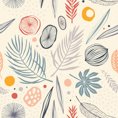 Seamless tropical pattern with tropical plants and palm leaves.