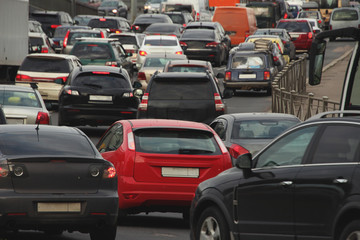 cars in traffic on a bridge