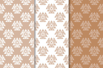 Brown floral backgrounds. Set of seamless patterns