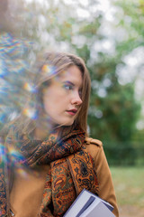 Naklejka premium Portrait of a beautiful girl in the fresh air.