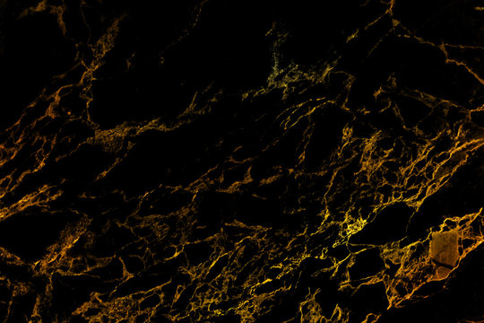 Gold and Black marble patterned texture background.