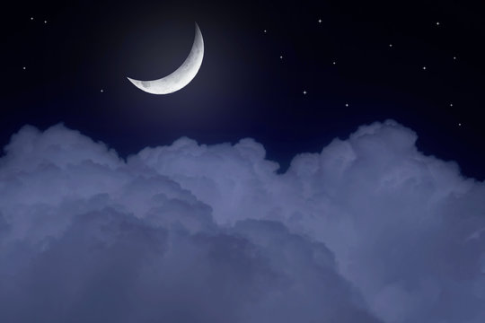 Stars,  moon and cumulonimbus in the night sky