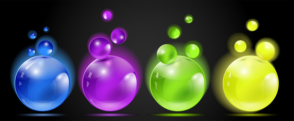 Glowing spheres on a black background. Neon balls