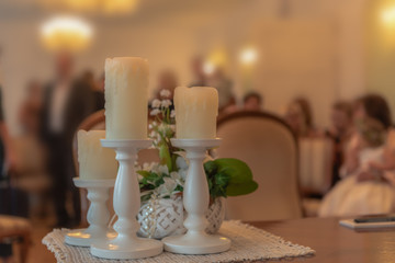 The table in the official office is decorated with candles for the wedding. Concept: wedding and ceremony