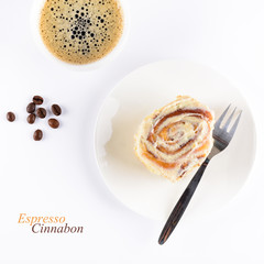 Cup of espresso and fresh cinnabon roll with glaze on white background. Homemade cinnamon bun and coffee. Top