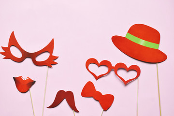 Colorful props for party. Carnival accessories set. Paper glasses, hat, lips, moustaches, tie on...