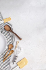 Kitchen utensils for baking - ceramic tart pan, Whisk, wooden spoons, silicone spatula, basting...