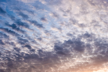 Colorful fluffy clouds in blue sky
