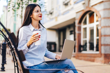 Freelancer girl outdoors