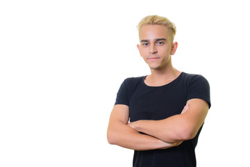 handsome trendy young guy in a black shirt on a white background. crossed his arms