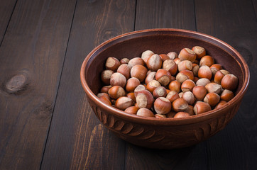 Hazelnut on a dark background.