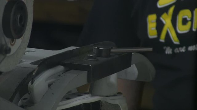 A 29 second clip of Ice Skates being Sharpened and Sparks flying.