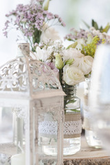 rustic romantic pastel flower arrangement decoration detail on wedding table