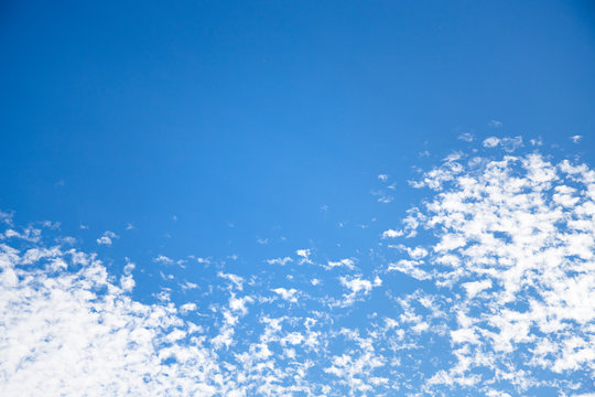Blue sky with cirro cumulus white clouds. Sky background