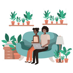 young couple using smartphone in living room