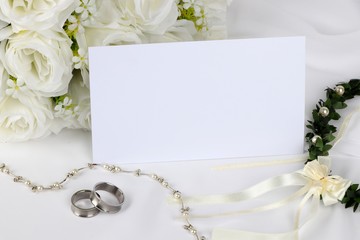 wedding invitation - blank wedding invitation with wedding rings and  white roses 