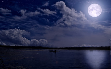 Obraz na płótnie Canvas Full moon over the river
